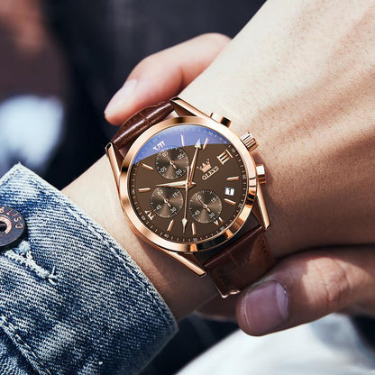 Reloj OLEVS oro rosa en la muñeca